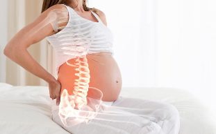 dolor de espalda durante el embarazo causa