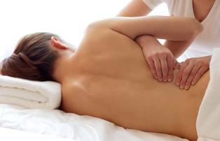 duele la espalda después del parto, masajes